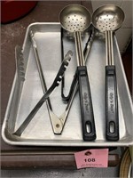 misc kitchen tools and full pan tongs strainer