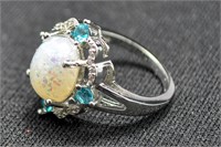 3.06ct opal and blue topaz ring