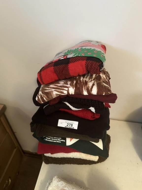 Stack of lasies sweaters