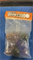 Otto Agua jewels marbles in bag