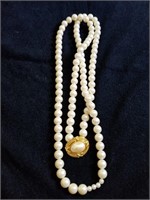 Extra long strand of beautiful faux Pearl's