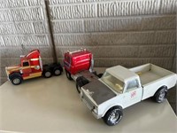 Vintage ERTL Buddy L & Nylint toy trucks.