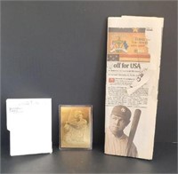 22k gold babe Ruth baseball card and newspaper