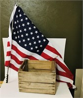 Vintage wooden crate and American Flag.