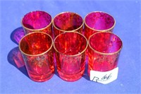 Six ruby glasses with gold trim