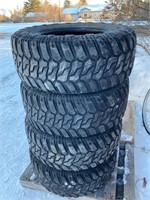 Four  33 X 12.5 or 18LT Tires, 20% tread Approx