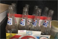 pepsi bottles in cardboard case