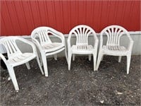 5 white plastic patio chairs