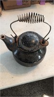 Cast iron speckled enameled teapot could use some