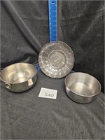 2 small stainless bowls and a steamer