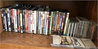 K -MIXED LOT OF DVDS & CDS (K45)