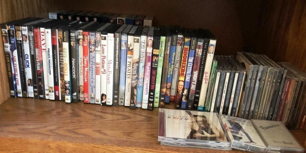 K -MIXED LOT OF DVDS & CDS (K45)