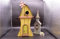 Pair of worn bird houses