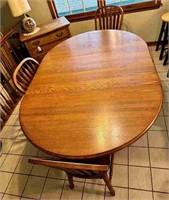 Oval table with four chairs - table measures 70"