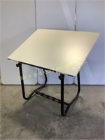 Drafting table with adjustable stand