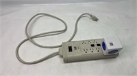 Surge protector with power cube
