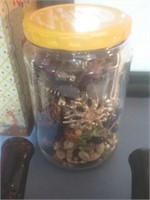 Pickle jar of costume jewelry and parts