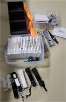 Wii Gaming System w/ controllers & games.