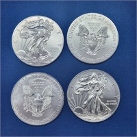 FOUR UNCIRCULATED 2012 AMERICAN SILVER EAGLES .999