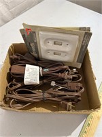 Box of electrical cords, and wall plates