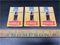 3 unopened vintage coke playing cards