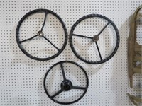 COLLECTION OF ANTIQUE TRACTOR STEERING WHEELS
