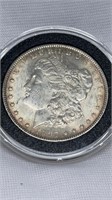 Of) 1897 Morgan Dollar condition AU