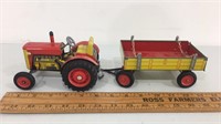 Tin Zetor tractor toy with trailer.