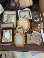 LOT OF PICTURE FRAMES CLOCK AND PICTURES