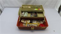 plastic tackle box with assorted tackle