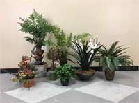 A collection of small artificial plants.