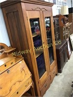 OAK GLASS FRONT CUPBOARD WITH LINEN DRAWERS AT BOT