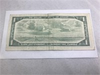 $1 Canadian bill from 1954 plate.