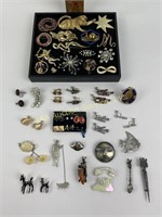 Costume jewelry pins, brooches, earrings