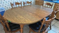 Table with 6 Chairs ( 2 leaves) 65 inches wide,