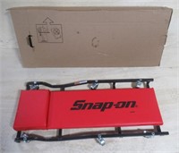 Snap-On automotive creeper in box.