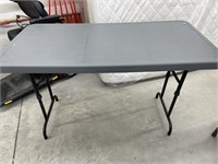 Plastic Table With Folding Legs 4 ' X 2 '