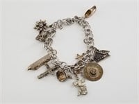 Sterling silver charm bracelet, with wide variety