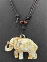 Hand carved bone elephant pendant with necklace