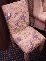 Completely upholstered armless chair