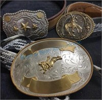 Three belts with buckles