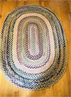 Antique braided rag rug, multicolored oval, small