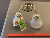 Polished brass 2 bulb swirled glass globe light