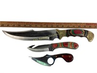 Hunting knives with inlaid wood handles.