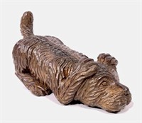 Carved wood dog, paws over ears, 20"L, 12"T,
