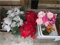 lot of fake floral and plastic baskets