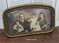 Bowed glass family portrait in great art Deco
