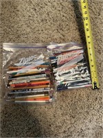 bags of pens and pencils
