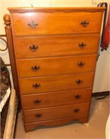 6 drawer maple tall chest in basement