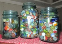 (3) Blue ball jars with various size marbles.